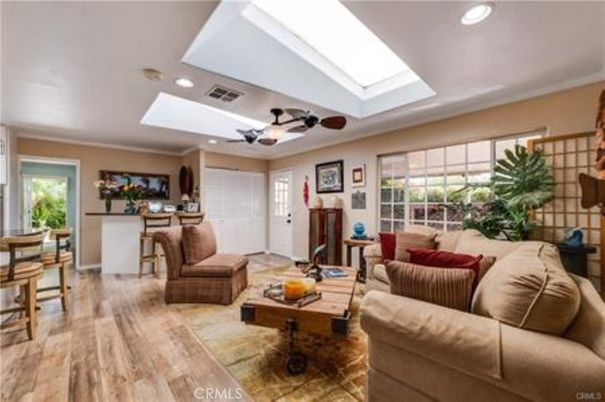Chandelier, Dining room, Interior, Kitchen, Living room, Pendant Lights, Recessed Lighting, Stainless Steel Appliances, Wood Texture Flooring