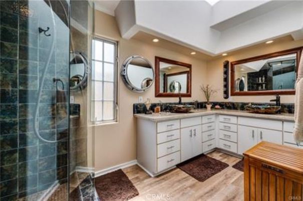 Bathroom, Dual Sink Vanities, Glass Shower, Interior, Recessed Lighting, Wood Texture Flooring