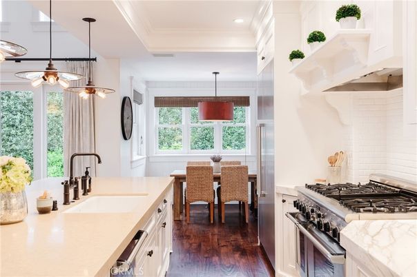 Dining room, Interior, Kitchen, Pendant Lights, Recessed Lighting, Stainless Steel Appliances, Wood Texture Flooring