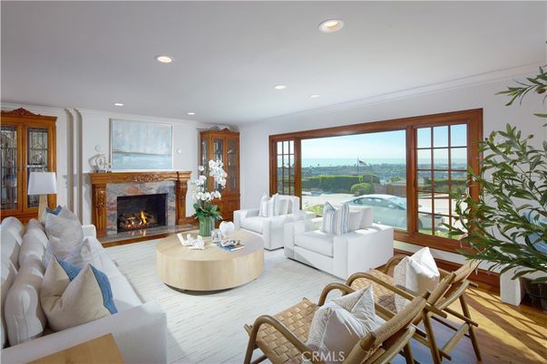 Fireplace, Interior, Living room, Recessed Lighting, Water, Wood Texture Flooring