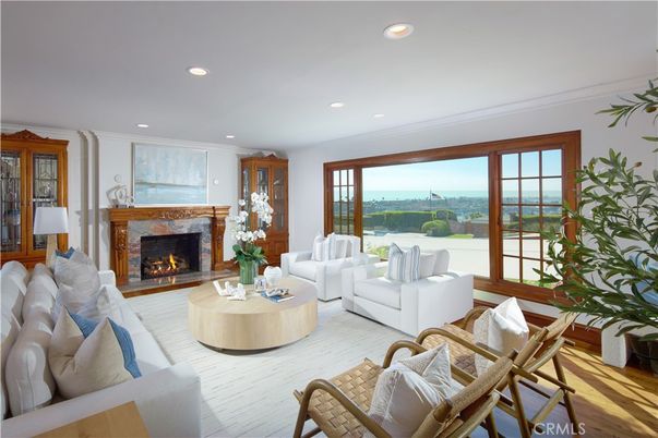 Fireplace, Interior, Living room, Recessed Lighting, Water, Wood Texture Flooring