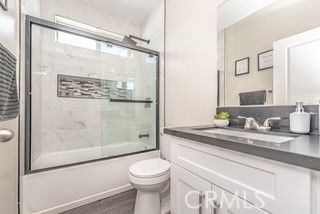 Bathroom, Glass Shower, Interior, Marble Walls, Wood Texture Flooring