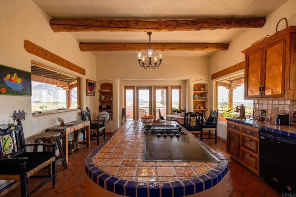 Chandelier, Dining room, Interior, Kitchen, Tile Countertops, Wooden Beams, Wood Texture Flooring
