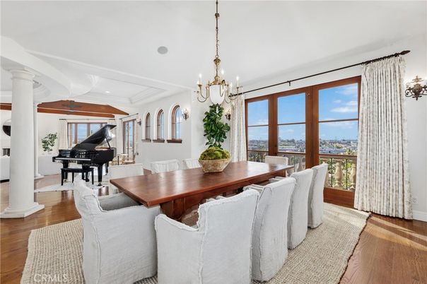 Chandelier, Dining room, Interior, Pendant Lights, Piano, Recessed Lighting, Water, Wood Texture Flooring