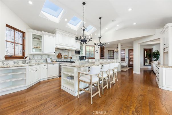 Chandelier, Interior, Kitchen, Pendant Lights, Recessed Lighting, Stainless Steel Appliances, Wood Texture Flooring