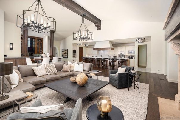 Chandelier, Dining room, Interior, Kitchen, Living room, Pendant Lights, Recessed Lighting, Stainless Steel Appliances, Wooden Beams, Wood Texture Flooring