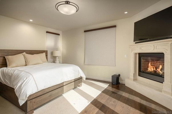 Bedroom, Fireplace, Interior, Recessed Lighting, Wood Texture Flooring