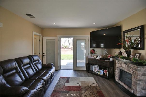 Fireplace, Interior, Living room, Recessed Lighting, Wood Texture Flooring