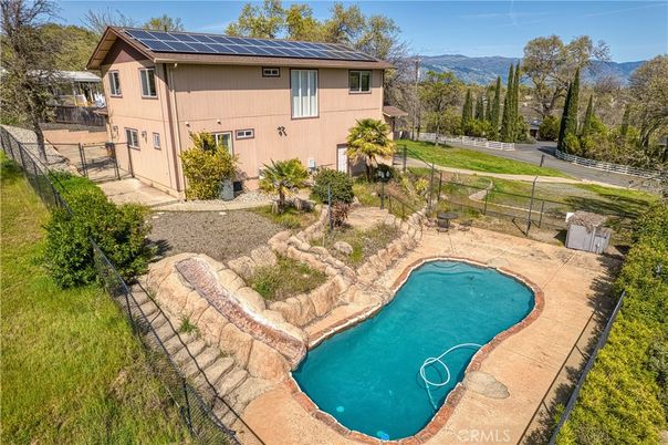 Exterior, Pool, Solar Panels