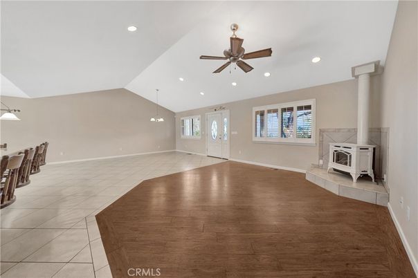 Empty room, Fireplace, Interior, Pendant Lights, Recessed Lighting, Wood Texture Flooring