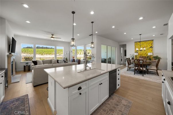 Dining room, Fireplace, Interior, Kitchen, Living room, Pendant Lights, Recessed Lighting, Wood Texture Flooring