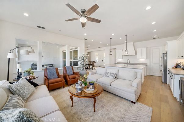 Dining room, Interior, Kitchen, Living room, Pendant Lights, Recessed Lighting, Stainless Steel Appliances, Wood Texture Flooring