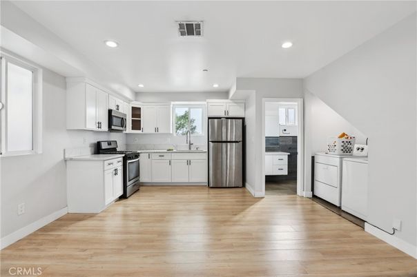 Interior, Kitchen, Recessed Lighting, Stainless Steel Appliances, Wood Texture Flooring