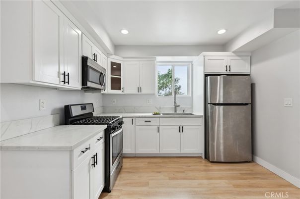 Interior, Kitchen, Recessed Lighting, Stainless Steel Appliances, Wood Texture Flooring