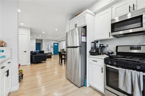 Interior, Kitchen, Living room, Recessed Lighting, Stainless Steel Appliances, Wood Texture Flooring