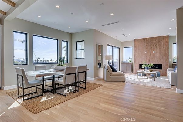 Dining room, Fireplace, Interior, Living room, Recessed Lighting, Wood Texture Flooring