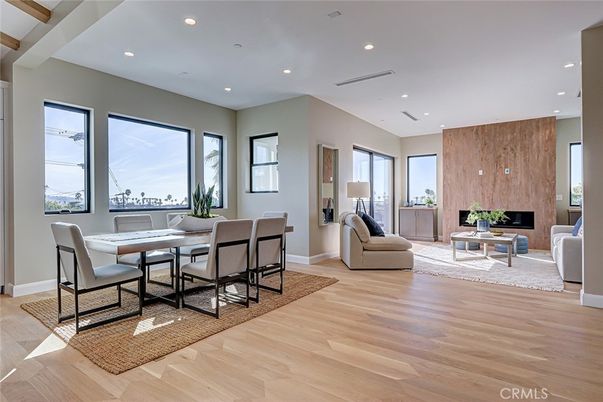 Dining room, Fireplace, Interior, Living room, Recessed Lighting, Wood Texture Flooring
