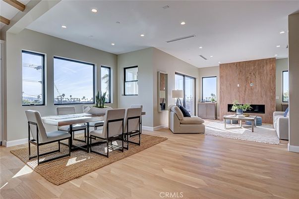 Dining room, Fireplace, Interior, Living room, Recessed Lighting, Wood Texture Flooring