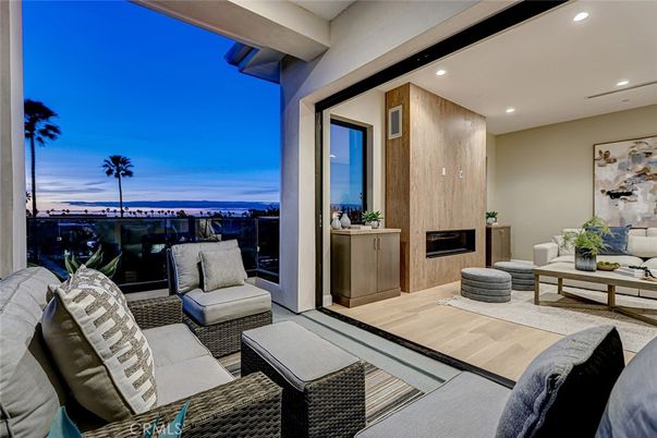 Fireplace, Interior, Living room, Recessed Lighting, Water, Wood Texture Flooring