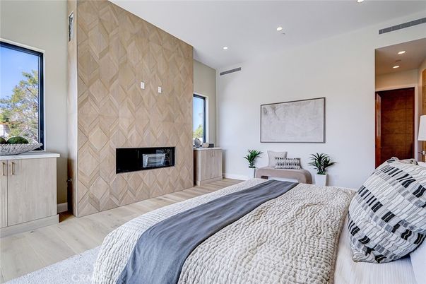 Bedroom, Fireplace, Interior, Recessed Lighting, Wood Texture Flooring