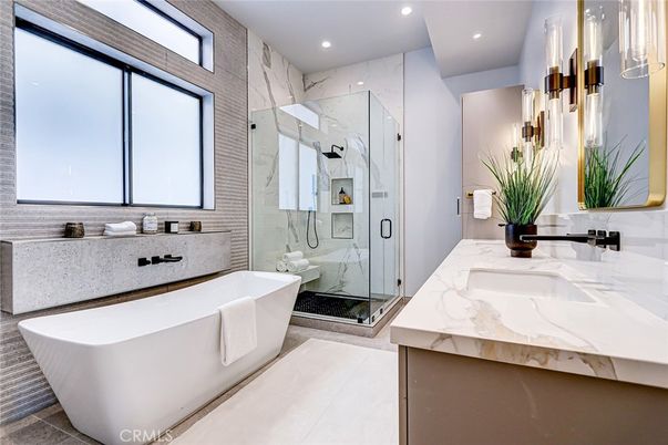 Bathroom, Dual Sink Vanities, Free Standing Baths, Glass Shower, Interior, Marble Walls, Recessed Lighting