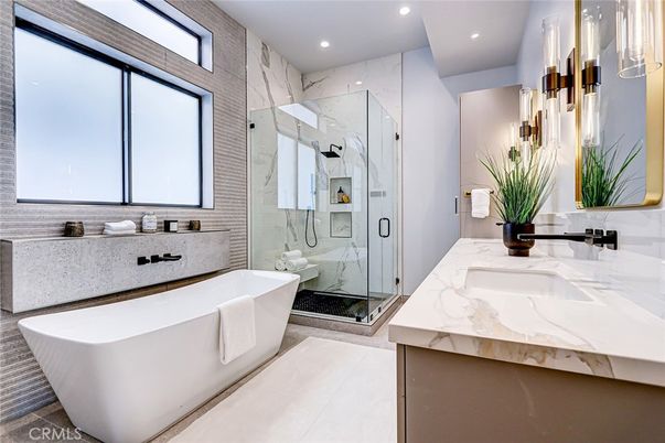 Bathroom, Dual Sink Vanities, Free Standing Baths, Glass Shower, Interior, Marble Walls, Recessed Lighting