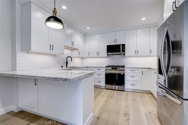 Interior, Kitchen, Pendant Lights, Recessed Lighting, Stainless Steel Appliances, Wood Texture Flooring