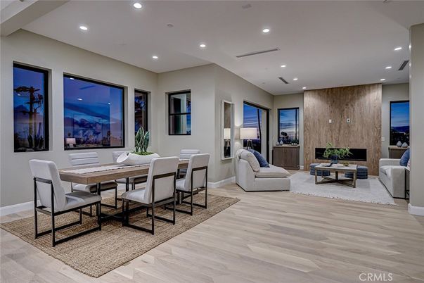 Dining room, Fireplace, Interior, Living room, Recessed Lighting, Wood Texture Flooring, Wooden Walls