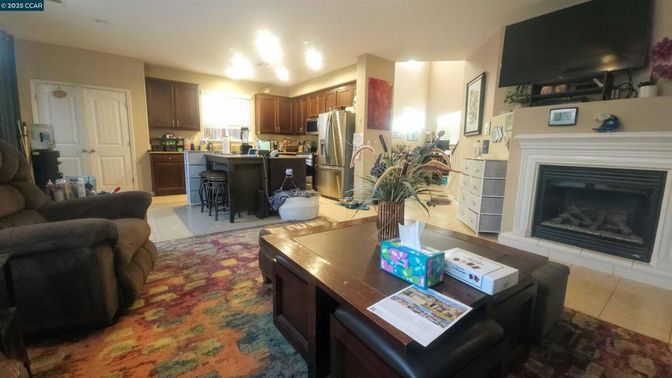 Fireplace, Interior, Kitchen, Living room, Recessed Lighting, Stainless Steel Appliances