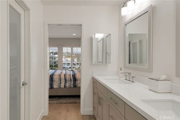 Bathroom, Bedroom, Dual Sink Vanities, Interior, Recessed Lighting, Wood Texture Flooring