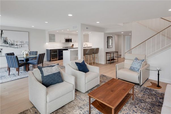 Dining room, Interior, Kitchen, Living room, Recessed Lighting, Stainless Steel Appliances, Wood Texture Flooring