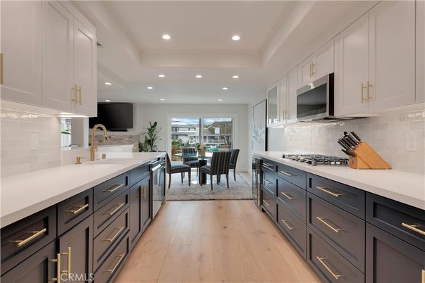 Dining room, Interior, Kitchen, Recessed Lighting, Stainless Steel Appliances, Wood Texture Flooring