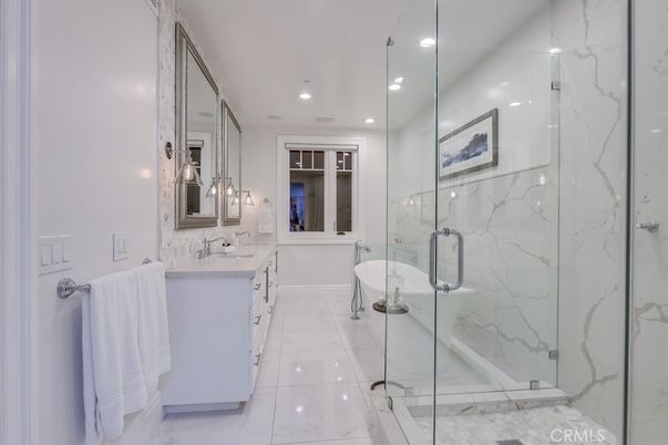 Bathroom, Dual Sink Vanities, Free Standing Baths, Glass Shower, Interior, Marble, Marble Walls, Recessed Lighting