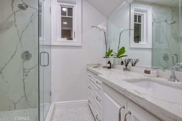 Bathroom, Dual Sink Vanities, Glass Shower, Interior, Marble Walls