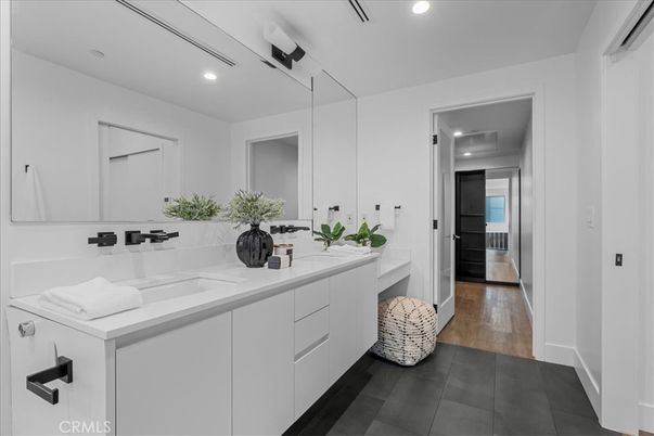 Bathroom, Dual Sink Vanities, Interior, Recessed Lighting, Wood Texture Flooring