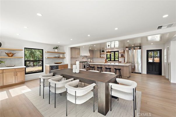 Dining room, Interior, Kitchen, Pendant Lights, Recessed Lighting, Stainless Steel Appliances, Wood Texture Flooring