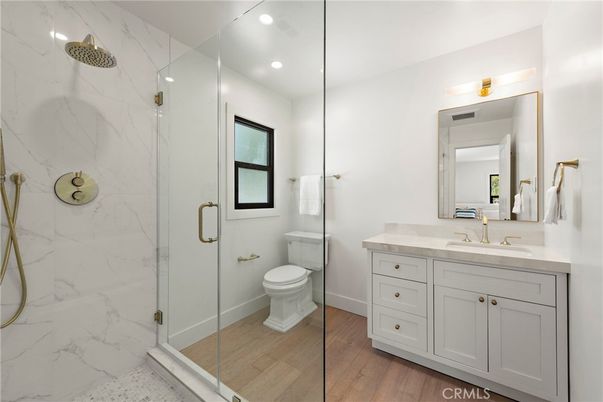 Bathroom, Glass Shower, Interior, Marble Walls, Recessed Lighting, Wood Texture Flooring