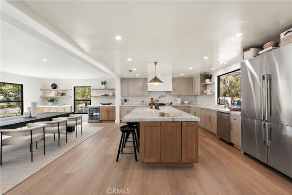 Dining room, Interior, Kitchen, Pendant Lights, Recessed Lighting, Stainless Steel Appliances, Wood Texture Flooring