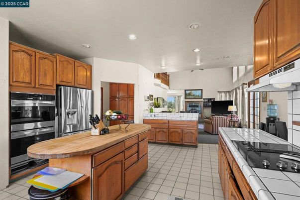 Interior, Kitchen, Recessed Lighting, Stainless Steel Appliances, Tile Countertops