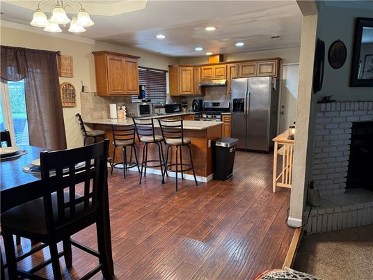 Dining room, Interior, Kitchen, Recessed Lighting, Stainless Steel Appliances, Wood Texture Flooring