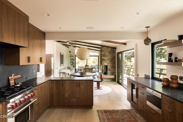 Interior, Kitchen, Pendant Lights, Recessed Lighting, Stainless Steel Appliances, Stone Walls, Wood Texture Flooring