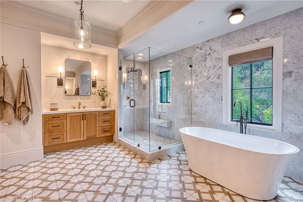 Bathroom, Dual Sink Vanities, Free Standing Baths, Glass Shower, Interior, Marble Walls, Pendant Lights, Recessed Lighting