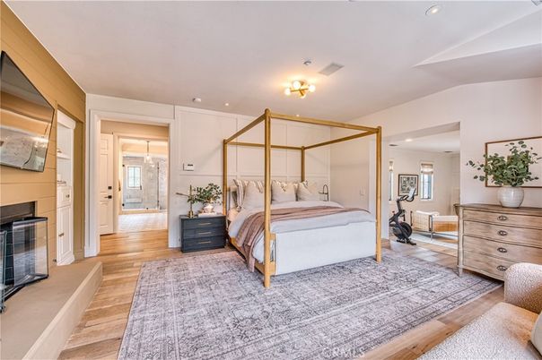 Bedroom, Fireplace, Fitness Equipment, Interior, Recessed Lighting, Wood Texture Flooring