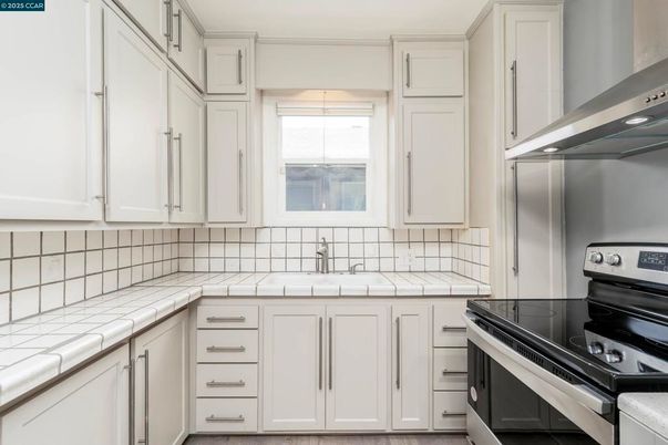Interior, Kitchen, Stainless Steel Appliances, Tile Countertops