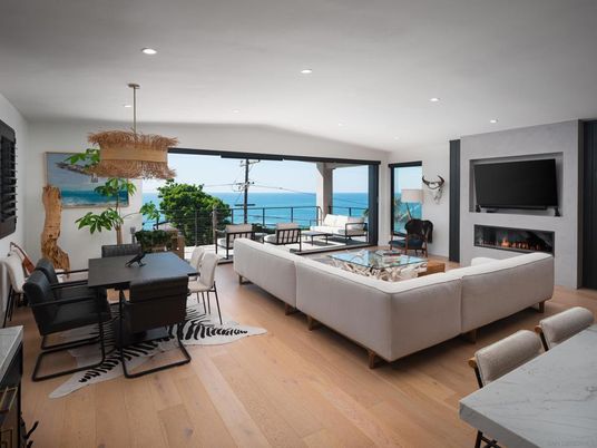 Dining room, Fireplace, Interior, Living room, Pendant Lights, Recessed Lighting, Water, Wood Texture Flooring