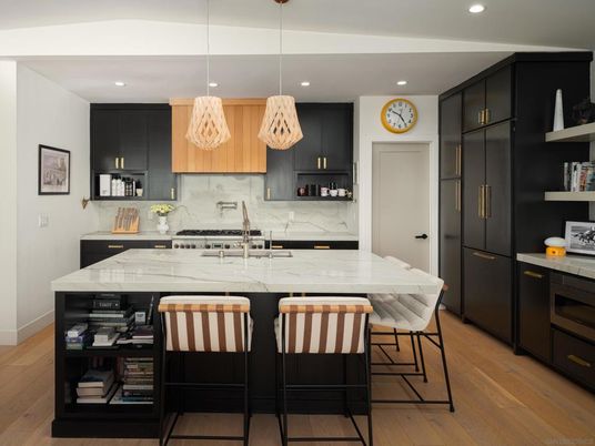Interior, Kitchen, Marble Walls, Pendant Lights, Recessed Lighting, Stainless Steel Appliances, Wood Texture Flooring
