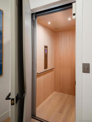 Elevator, Interior, Recessed Lighting, Wooden Ceilings, Wood Texture Flooring, Wooden Walls