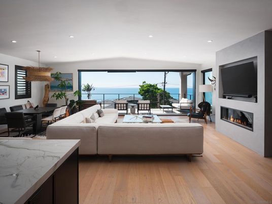 Dining room, Fireplace, Interior, Living room, Pendant Lights, Recessed Lighting, Water, Wood Texture Flooring