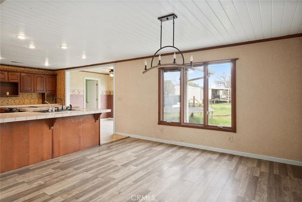 Interior, Kitchen, Pendant Lights, Recessed Lighting, Tile Countertops, Wood Texture Flooring