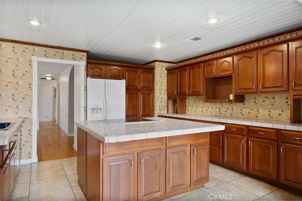 Interior, Kitchen, Recessed Lighting, Tile Countertops, Wood Texture Flooring